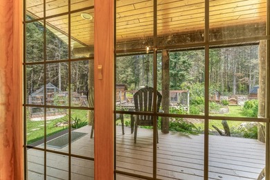 Set on 1.19 wooded acres in the heart of Sugar Camp, this 1,746 - photo 7
