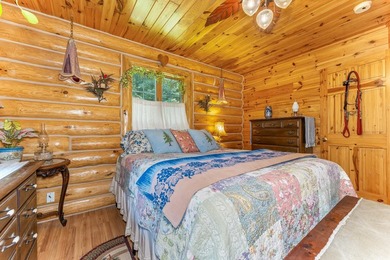 Set on 1.19 wooded acres in the heart of Sugar Camp, this 1,746 - photo 8