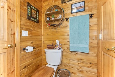 Set on 1.19 wooded acres in the heart of Sugar Camp, this 1,746 - photo 10