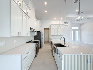 BRAND NEW WATERFRONT MASTERPIECE WITH GULF ACCESS. Welcome to - photo 13