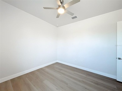 BRAND NEW WATERFRONT MASTERPIECE WITH GULF ACCESS. Welcome to - photo 25