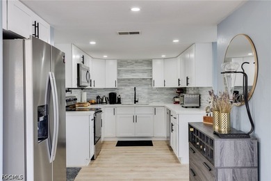 Completely renovated and move-in ready, this beautifully updated - photo 3