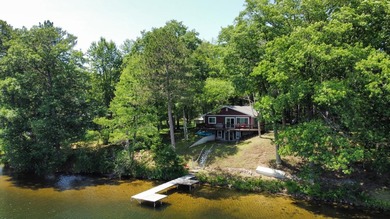A true Northwoods gem, located on 90' of Beautiful, sandy - photo 2