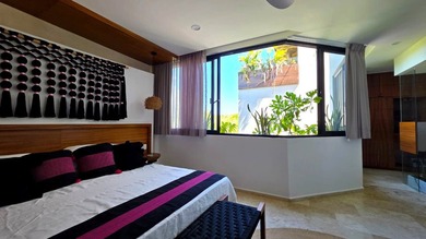Discover this exceptional 3-bedroom penthouse for sale in Tulum - photo 8