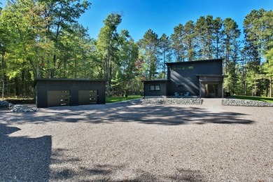 Nestled on 2.68 wooded acres with an additional 1.31-acre vacant - photo 2