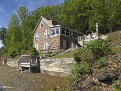 Discover the enduring charm of the Adirondack region with this - photo 2