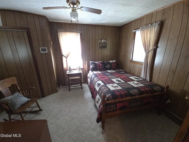 Discover the enduring charm of the Adirondack region with this - photo 8