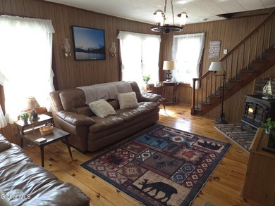 Discover the enduring charm of the Adirondack region with this - photo 10