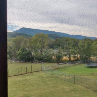 Welcome to 1062 Tiftonia Vew Rd, a pleasant one-owner home with