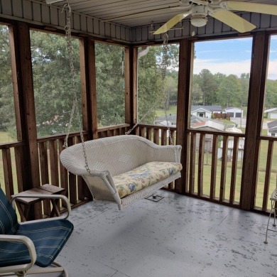 Welcome to 1062 Tiftonia Vew Rd, a pleasant one-owner home with