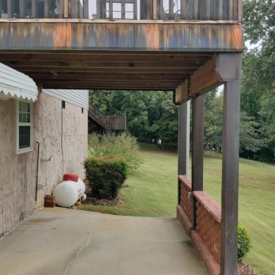 Welcome to 1062 Tiftonia Vew Rd, a pleasant one-owner home with