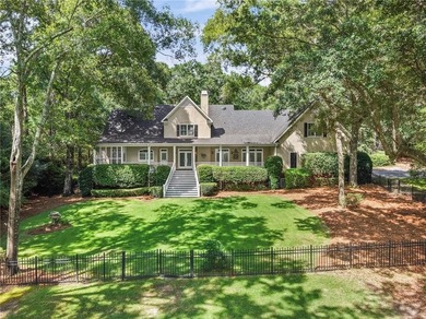 Private gated entrance, 4 sprawling acres, and 108 feet of lake - photo 35