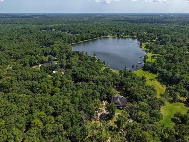 Private gated entrance, 4 sprawling acres, and 108 feet of lake - photo 39