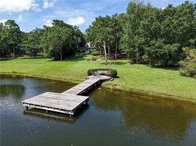 Private gated entrance, 4 sprawling acres, and 108 feet of lake - photo 43