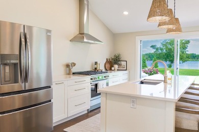 Experience lakefront living at its finest in this renovated - photo 3