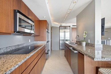 Perched on the penthouse level of prestigious La Playa, this - photo 8