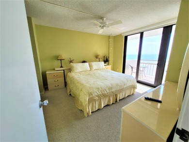 Ocean front! Feel the balmy breezes, revel in the crimson - photo 12
