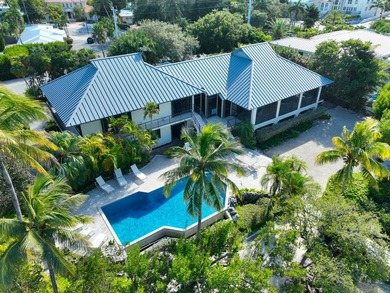 First time ever offered, this extraordinary open-water estate - photo 2