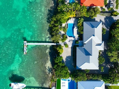 First time ever offered, this extraordinary open-water estate - photo 4