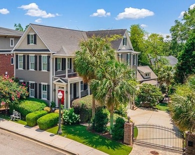 Step through the gated entry into a gracious 5,000+ square foot