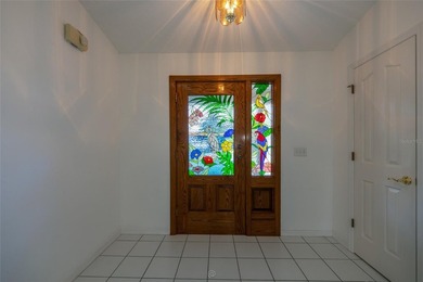 A welcoming front porch and stunning, custom stained-glass front - photo 3