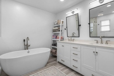 Stunning, fully renovated 4 BD, 2.5 BA residence situated on an - photo 13