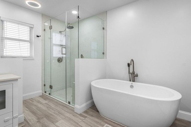 Stunning, fully renovated 4 BD, 2.5 BA residence situated on an - photo 14