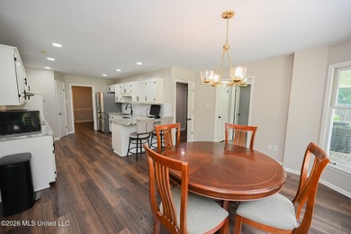 Nestled on a stunning 3.7-acre treed lot complete with a private - photo 18