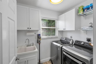 Stunning, fully renovated 4 BD, 2.5 BA residence situated on an - photo 19