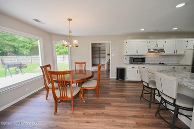Nestled on a stunning 3.7-acre treed lot complete with a private - photo 20