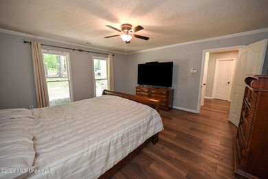 Nestled on a stunning 3.7-acre treed lot complete with a private - photo 27