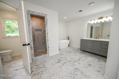 Nestled on a stunning 3.7-acre treed lot complete with a private - photo 31