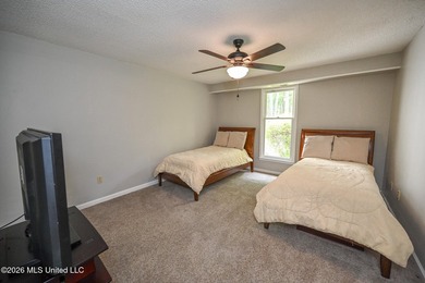 Nestled on a stunning 3.7-acre treed lot complete with a private - photo 42