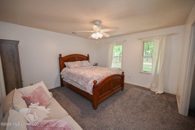 Nestled on a stunning 3.7-acre treed lot complete with a private - photo 48