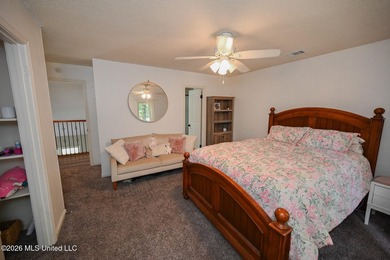 Nestled on a stunning 3.7-acre treed lot complete with a private - photo 49