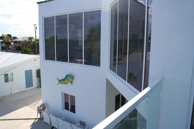 Walk into this luxurious palace with captivating open water - photo 9
