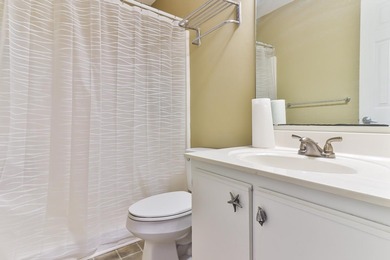 Welcome to 4990 Windsor Green Way, Unit 102, a first-floor condo