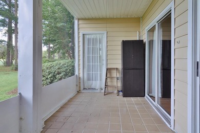 Welcome to 4990 Windsor Green Way, Unit 102, a first-floor condo