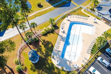 Welcome to 4990 Windsor Green Way, Unit 102, a first-floor condo