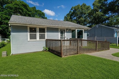This 3-bedroom, 1.5-bath home with a detached 2-car garage is - photo 1