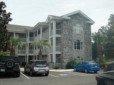 Enjoy the convenience of this 1st floor corner unit! Close to - photo 2