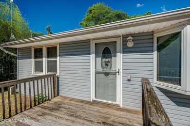 This 3-bedroom, 1.5-bath home with a detached 2-car garage is - photo 3
