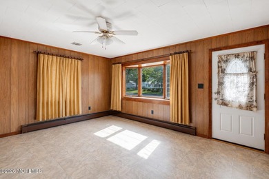 This 3-bedroom, 1.5-bath home with a detached 2-car garage is - photo 9