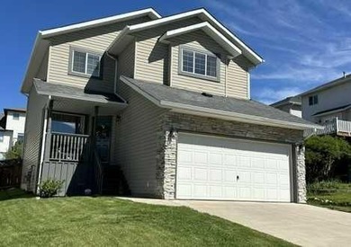 Welcome to this beautifully maintained 1,550 sq. ft. family home - photo 1