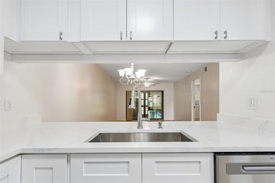 Welcome to Trafalgar Square and this updated 2-bedroom - photo 4