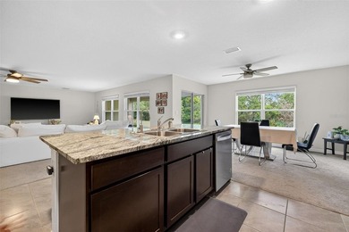 Welcome to this beautifully maintained 4-bedroom, 2-bathroom - photo 6