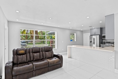 Discover this beautifully maintained 4-bedroom, 2-bathroom - photo 6