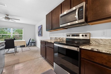 Welcome to this beautifully maintained 4-bedroom, 2-bathroom - photo 8