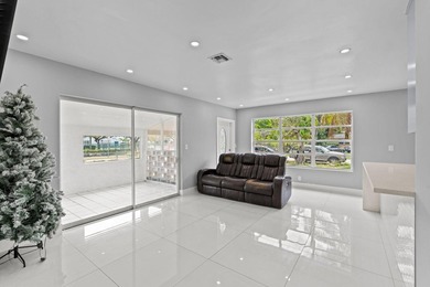 Discover this beautifully maintained 4-bedroom, 2-bathroom - photo 8
