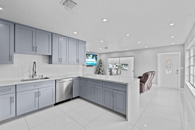 Discover this beautifully maintained 4-bedroom, 2-bathroom - photo 9